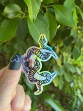 Load image into Gallery viewer, Snake And Moon Holographic Sticker. Sun And Moon Sticker. Witchy Sticker. Gothic Sticker. High quality Trippy Sticker