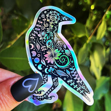 Load image into Gallery viewer, Crow Holographic Sticker. Sun And Moon Sticker. Bird Sticker. Witch Sticker. Gothic Sticker. High quality Trippy Sticker