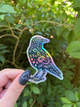 Load image into Gallery viewer, Crow Holographic Sticker. Sun And Moon Sticker. Bird Sticker. Witch Sticker. Gothic Sticker. High quality Trippy Sticker