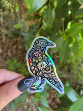 Load image into Gallery viewer, Crow Holographic Sticker. Sun And Moon Sticker. Bird Sticker. Witch Sticker. Gothic Sticker. High quality Trippy Sticker