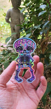 Load image into Gallery viewer, Halloween Skeleton Sticker. Holographic Skeleton. Waterproof Sticker. Laptop Sticker. Water Bottle Sticker. High quality Trippy Sticker