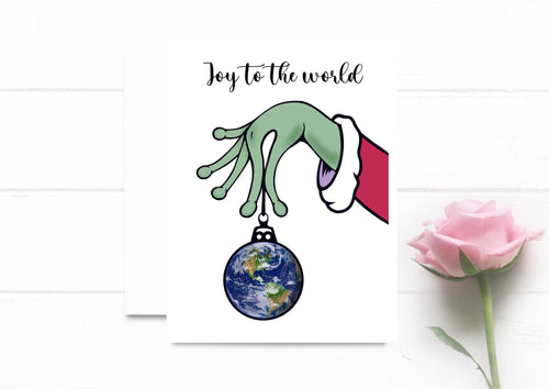 Joy To The World. Alien Hand Holding Earth Christmas Ornament. Holiday Card. Funny Xmas Card.