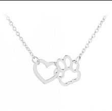 Load image into Gallery viewer, Paw In Heart Gold Necklace. Animal Lover Gift. Gift For Dog Owners. Cat Owners Jewellery. Dog Paw Print Necklace. Cat Paw Necklace. Silver