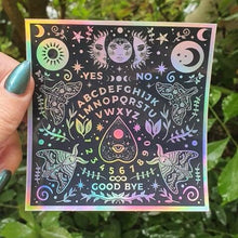 Load image into Gallery viewer, Ouija Board Holographic  Sticker. Sun And Moon Sticker. Witch Sticker. Laptop Sticker. Flask Sticker. High Quality Sticker. Ouijaboard